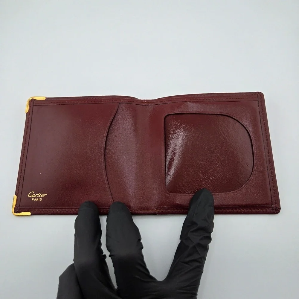 Cartier Must de Cartier Bifold Wallet Burgundy Leather Gold Corners Logo ID Slot